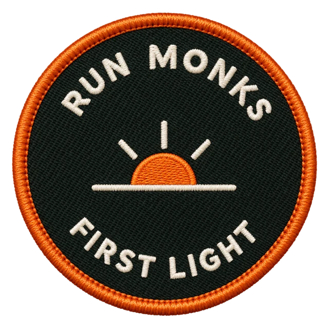 First light badge: a rising sun