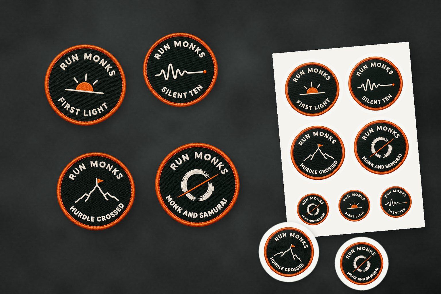 Run Monks embroidered patches and a sheet of die-cut stickers on slate